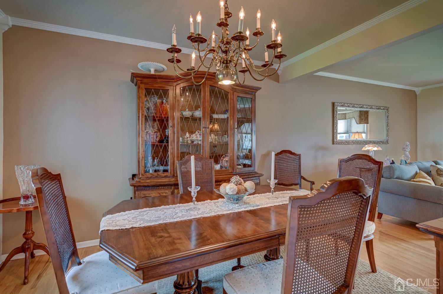 19 Chelsea Road Old Bridge, NJ 08857 - Photo 12 of 34 a view of a dining room with furniture and chandelier