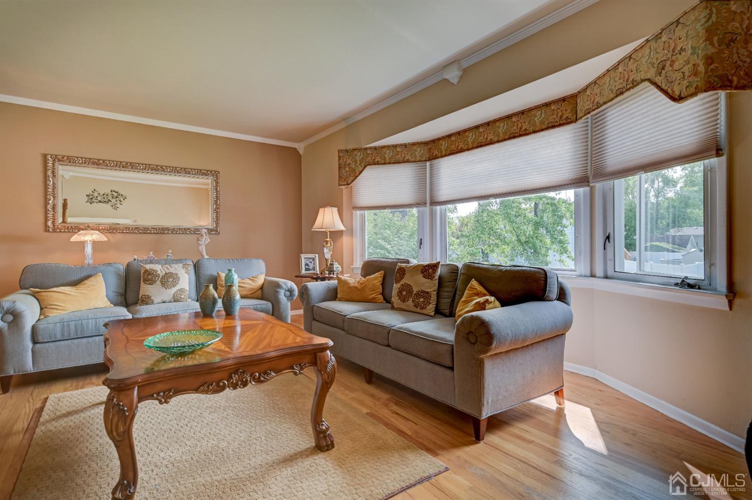 19 Chelsea Road Old Bridge, NJ 08857 - Photo 13 of 34 a living room with furniture and a large window
