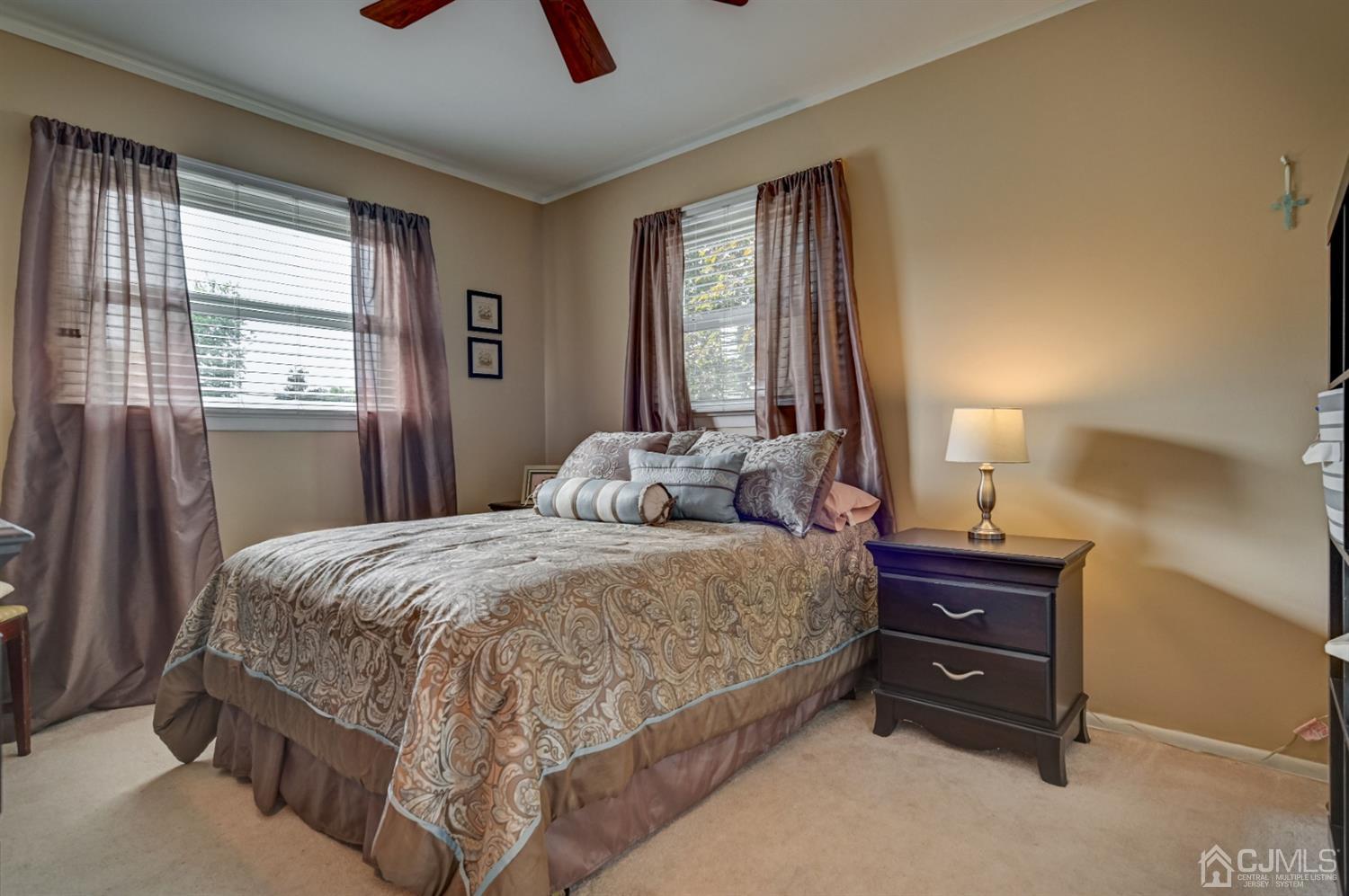 19 Chelsea Road Old Bridge, NJ 08857 - Photo 22 of 34 a bedroom with a bed and a dresser