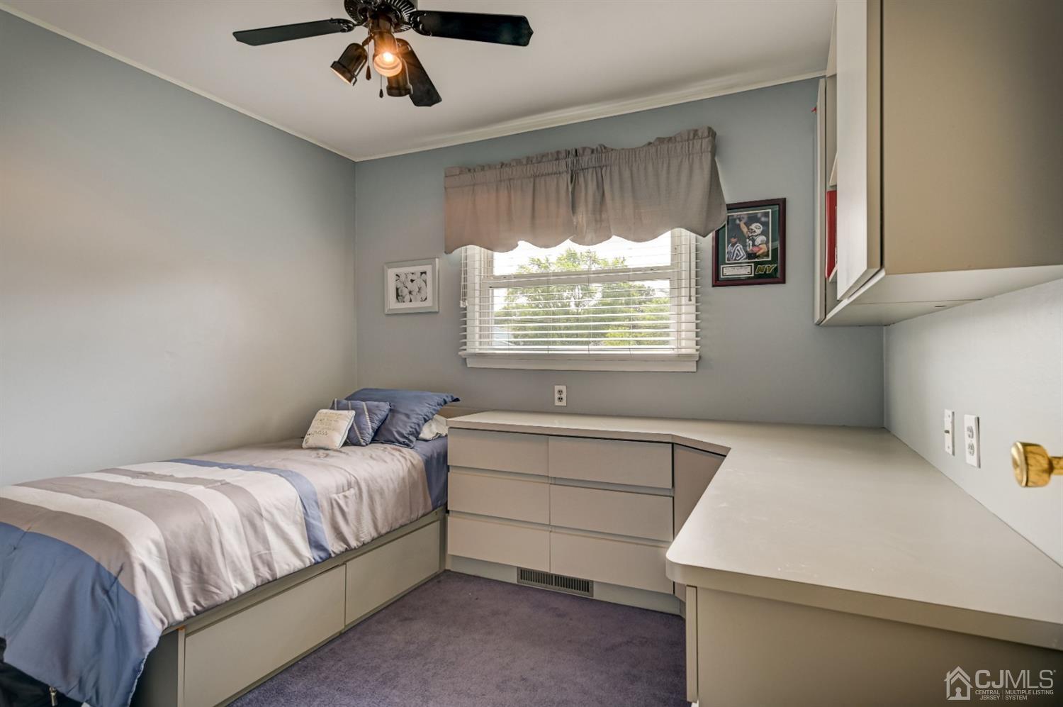 19 Chelsea Road Old Bridge, NJ 08857 - Photo 23 of 34 a bedroom with a bed and window