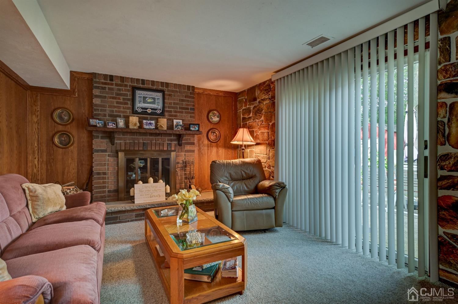 19 Chelsea Road Old Bridge, NJ 08857 - Photo 27 of 34 a living room with furniture and a fireplace