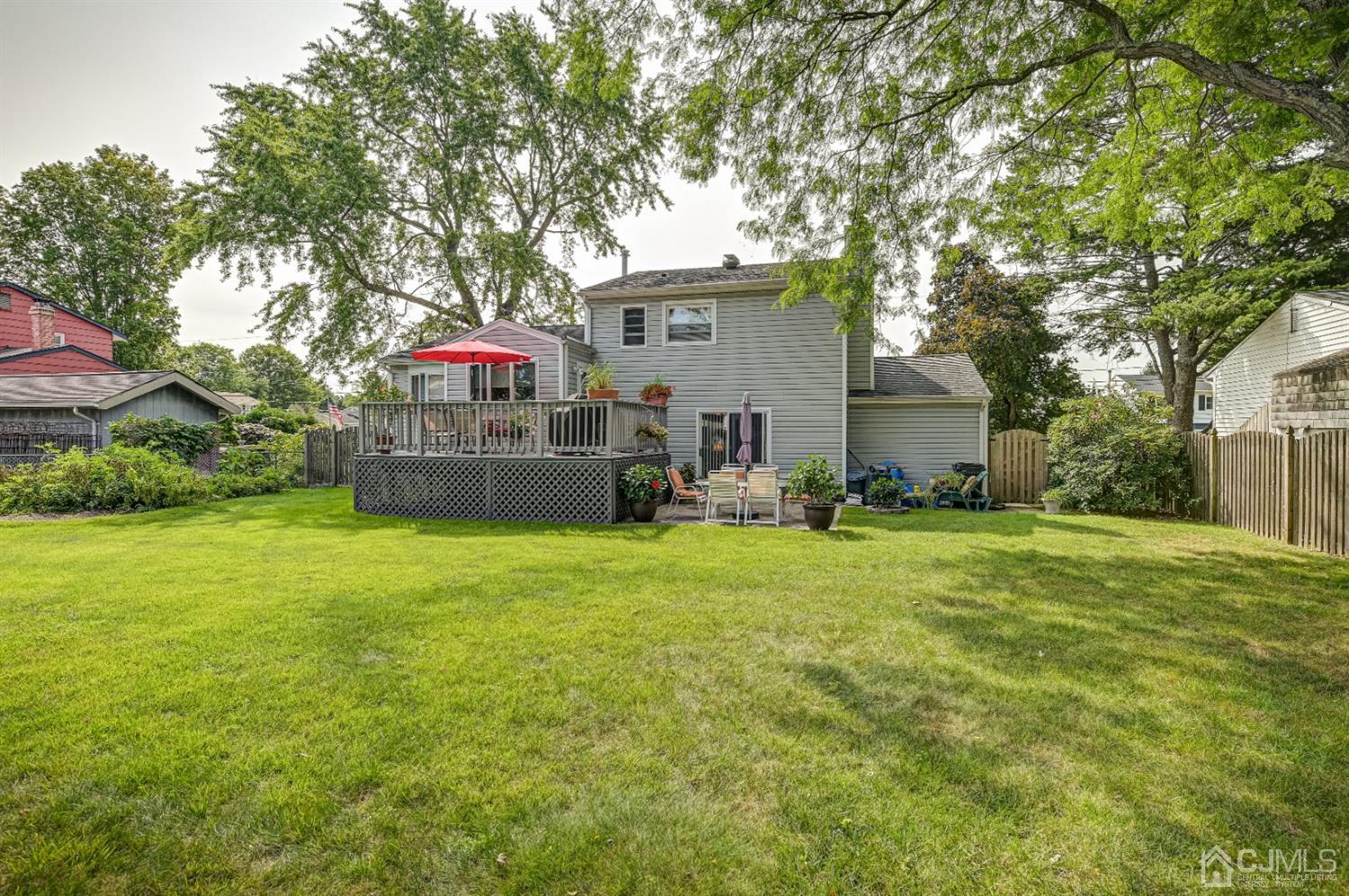 19 Chelsea Road Old Bridge, NJ 08857 - Photo 31 of 34 a front view of house with yard and trees