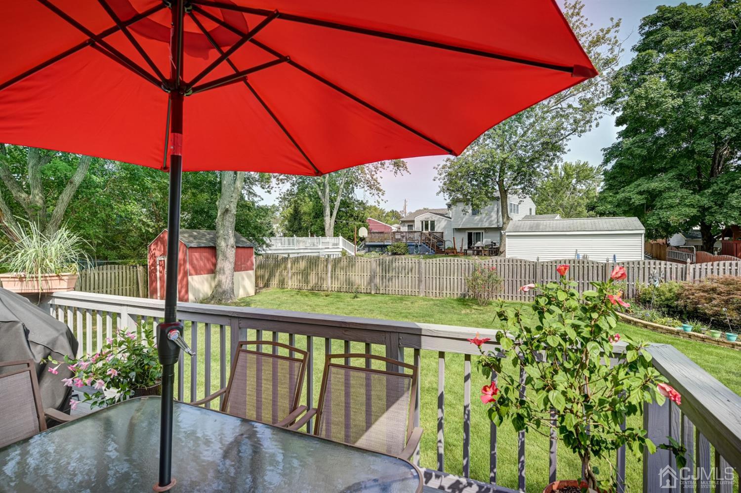 19 Chelsea Road Old Bridge, NJ 08857 - Photo 32 of 34 a view of a balcony with chairs and potted plants
