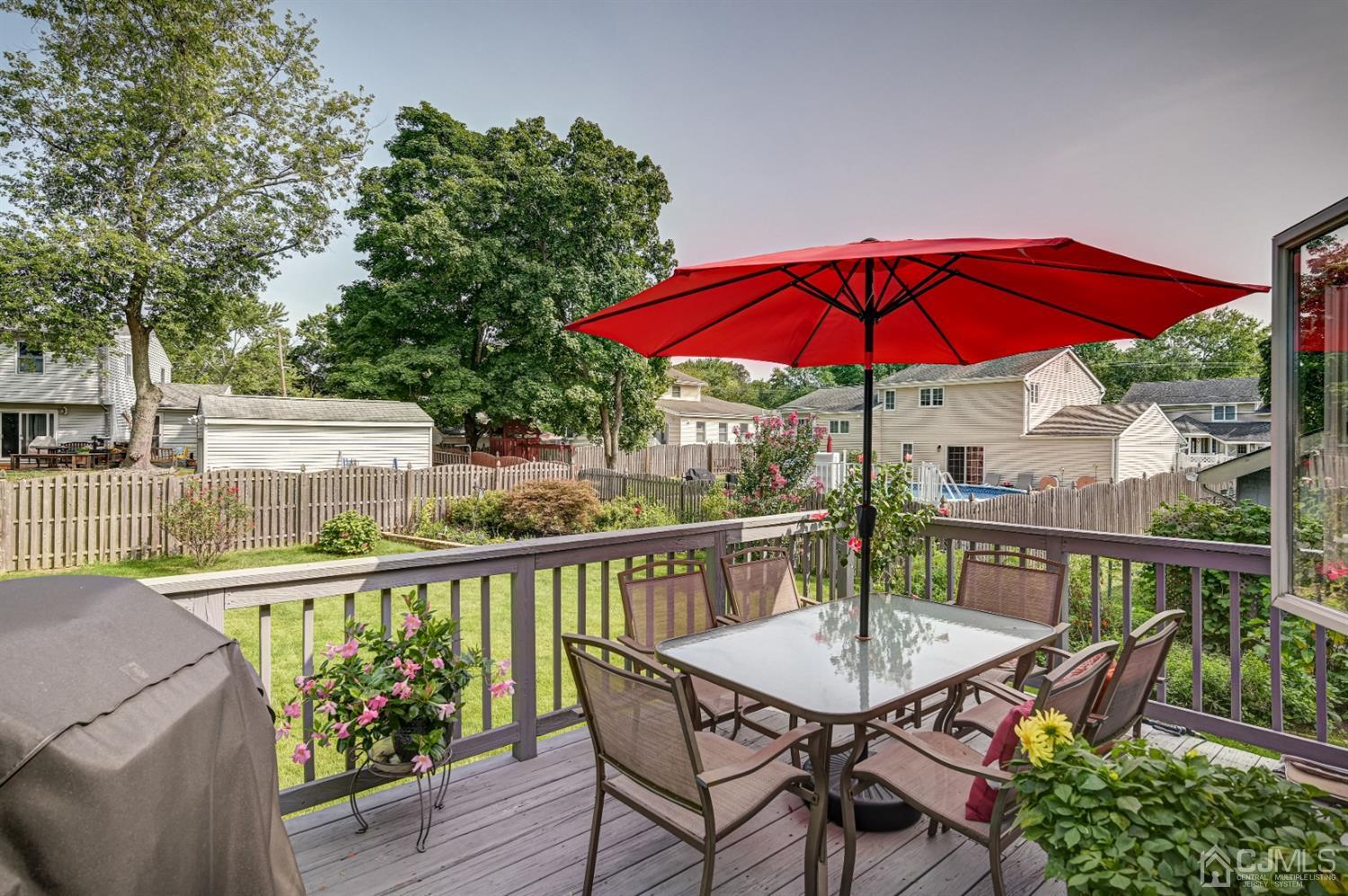 19 Chelsea Road Old Bridge, NJ 08857 - Photo 33 of 34 a view of balcony with outdoor seating and wooden floor