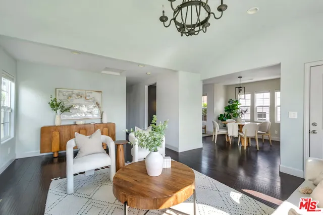 a living room with furniture or window and a dining table