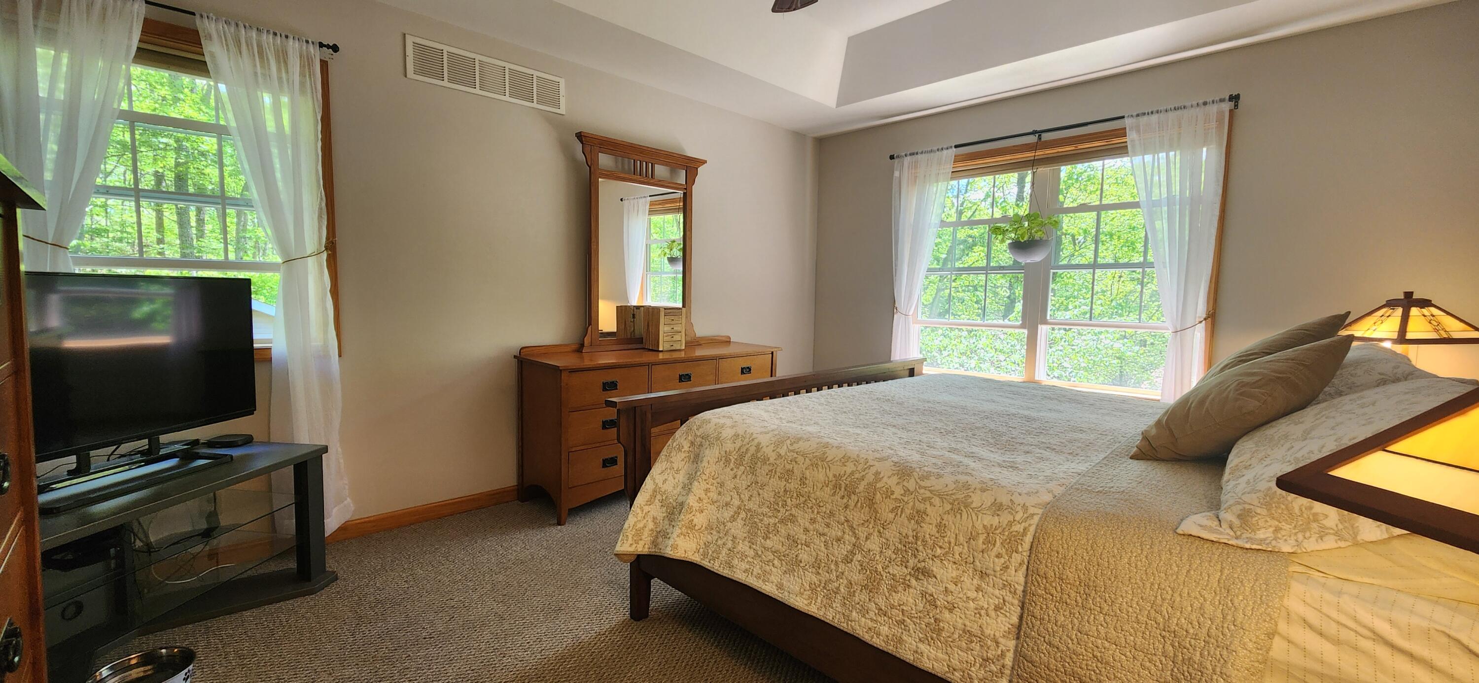 1729 Hemlock Drive Scotrun, PA 18355 - Photo 11 of 21 a bed sitting in a bedroom next to a window