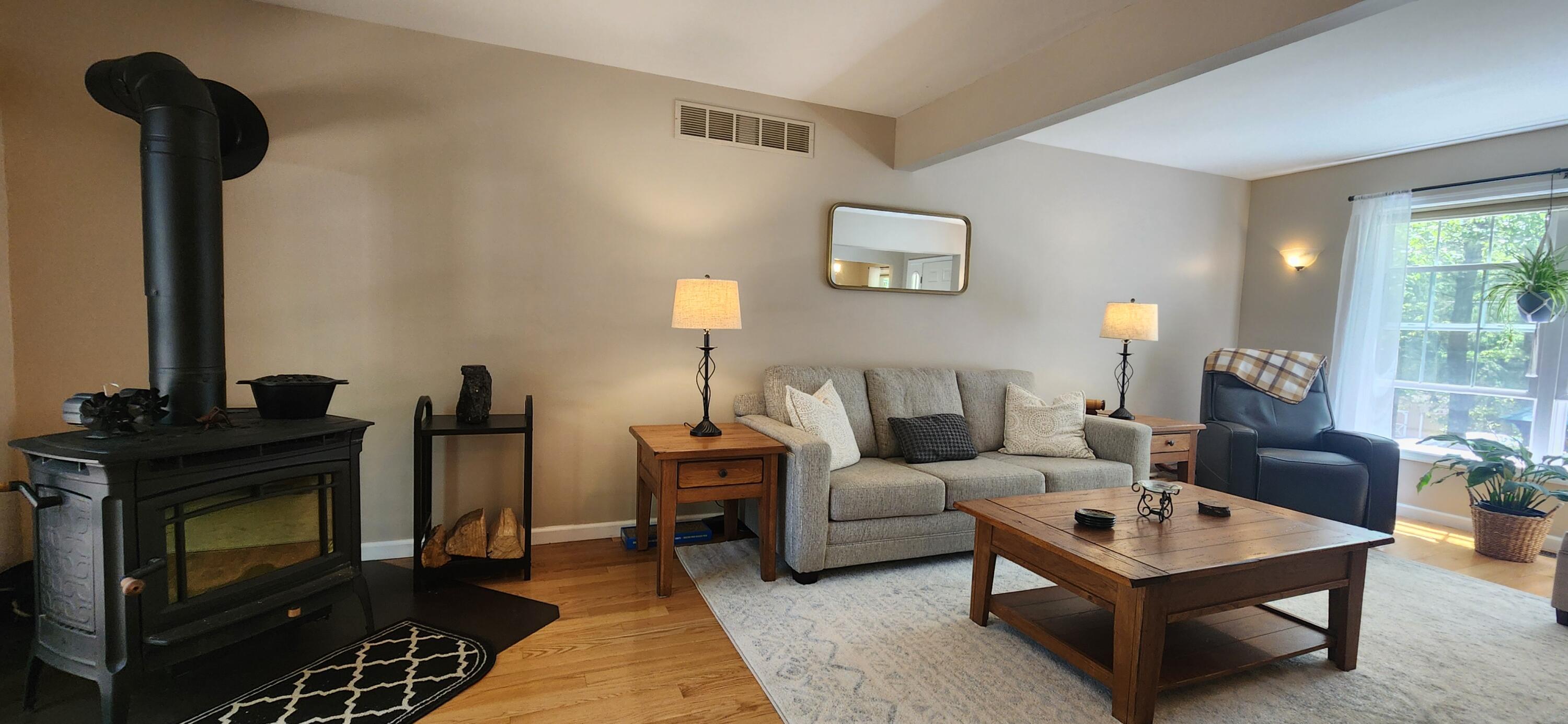 1729 Hemlock Drive Scotrun, PA 18355 - Photo 5 of 21 a living room with furniture and a fireplace