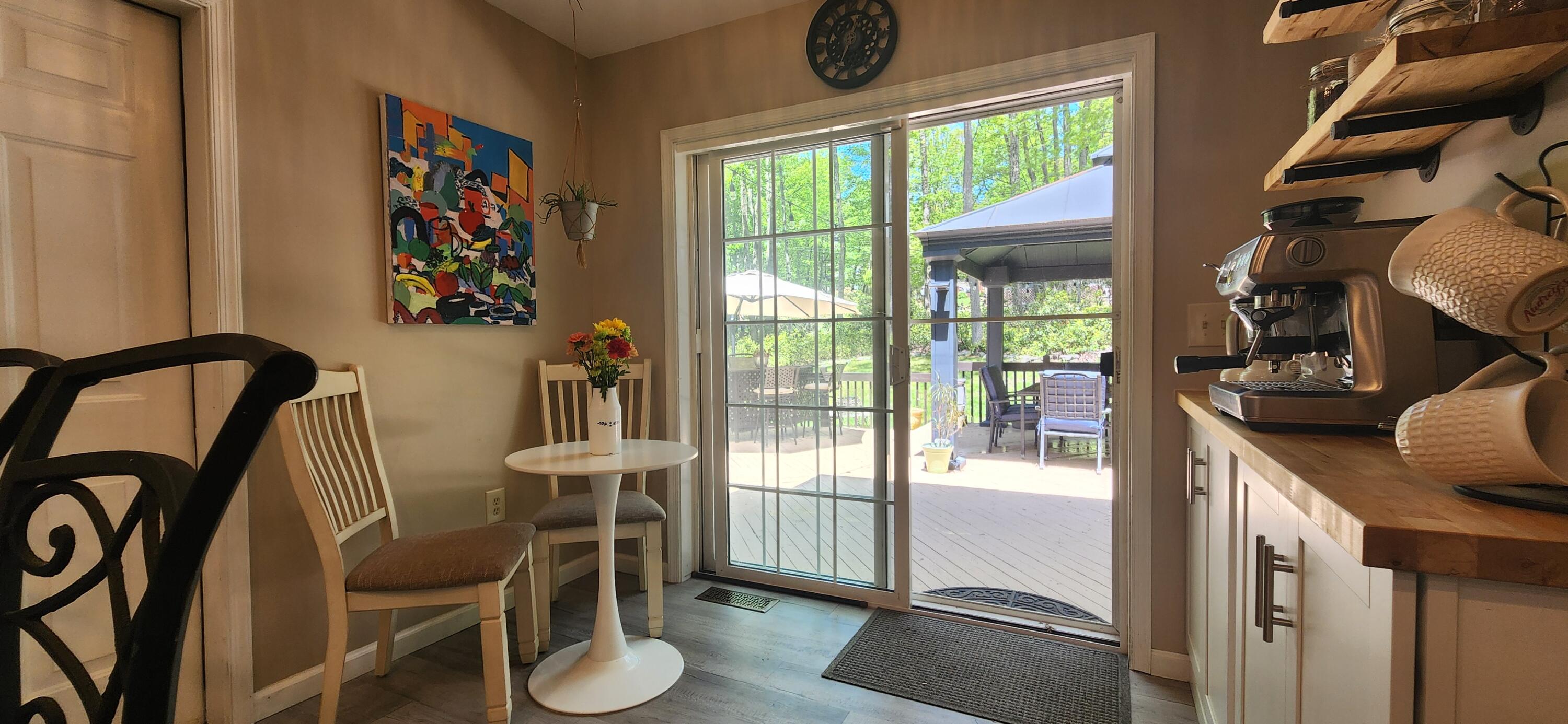 1729 Hemlock Drive Scotrun, PA 18355 - Photo 6 of 21 a view of an entryway with wooden floor and windows