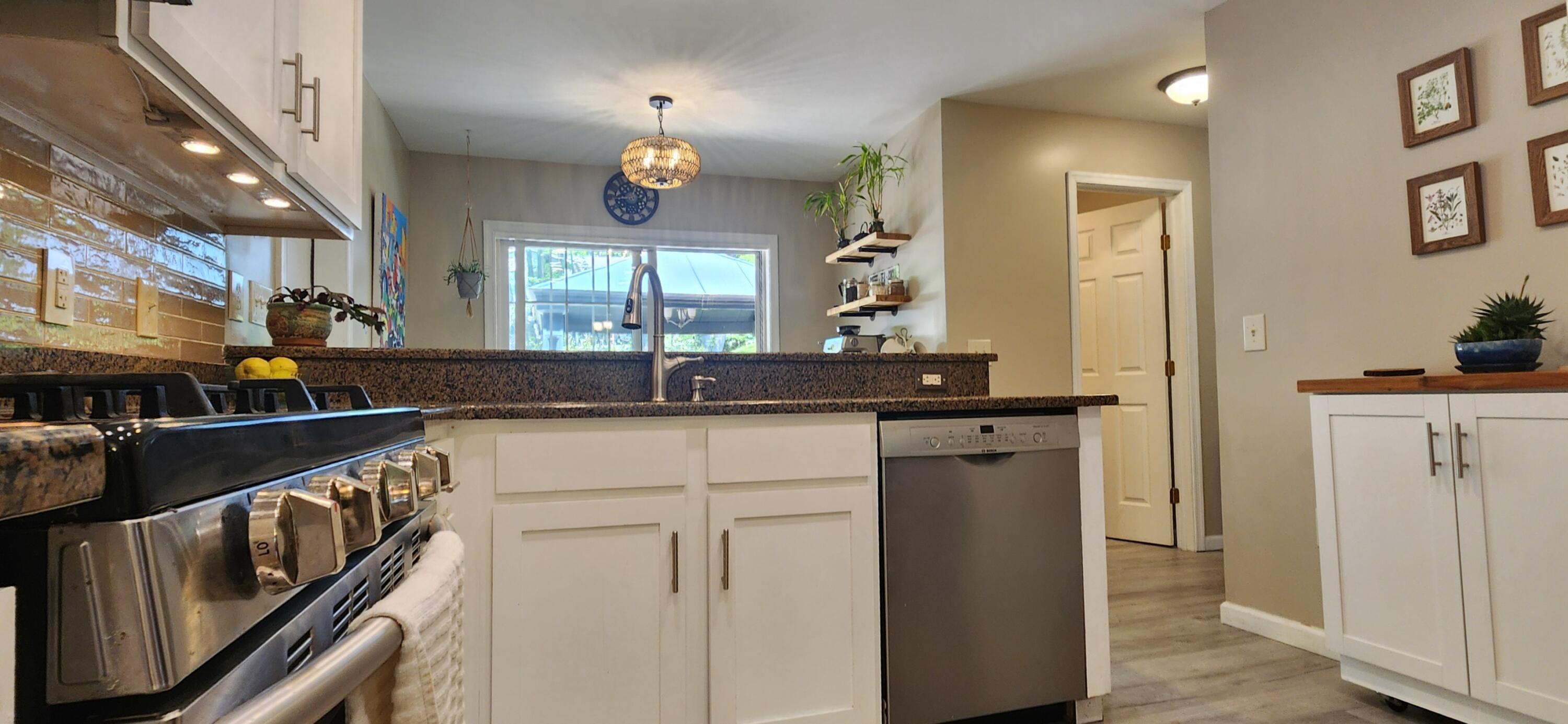1729 Hemlock Drive Scotrun, PA 18355 - Photo 8 of 21 a kitchen with a sink and a refrigerator
