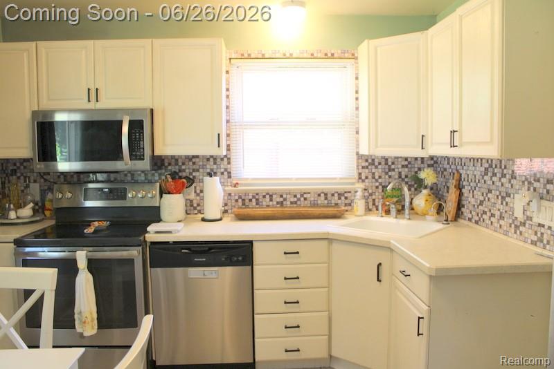 8951 Stevens Street Taylor, MI 48180 - Photo 13 of 32 ADDITIONAL WINDOW IN THE KITCHEN FOR LOTS OF NATURAL LIGHT!