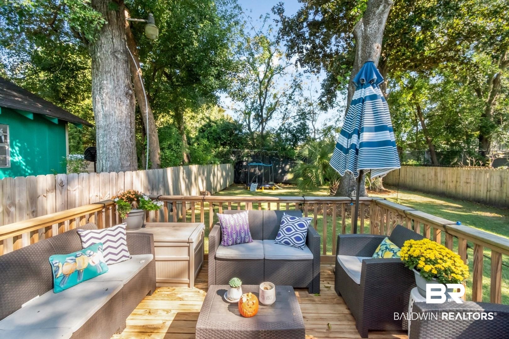 116 Item Avenue Mobile, AL 36607 - Photo 24 of 33 Wooden terrace with an outdoor hangout area