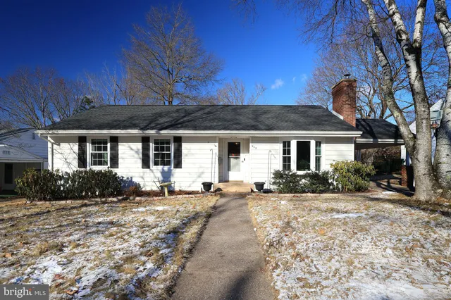 a front view of a house with a patio