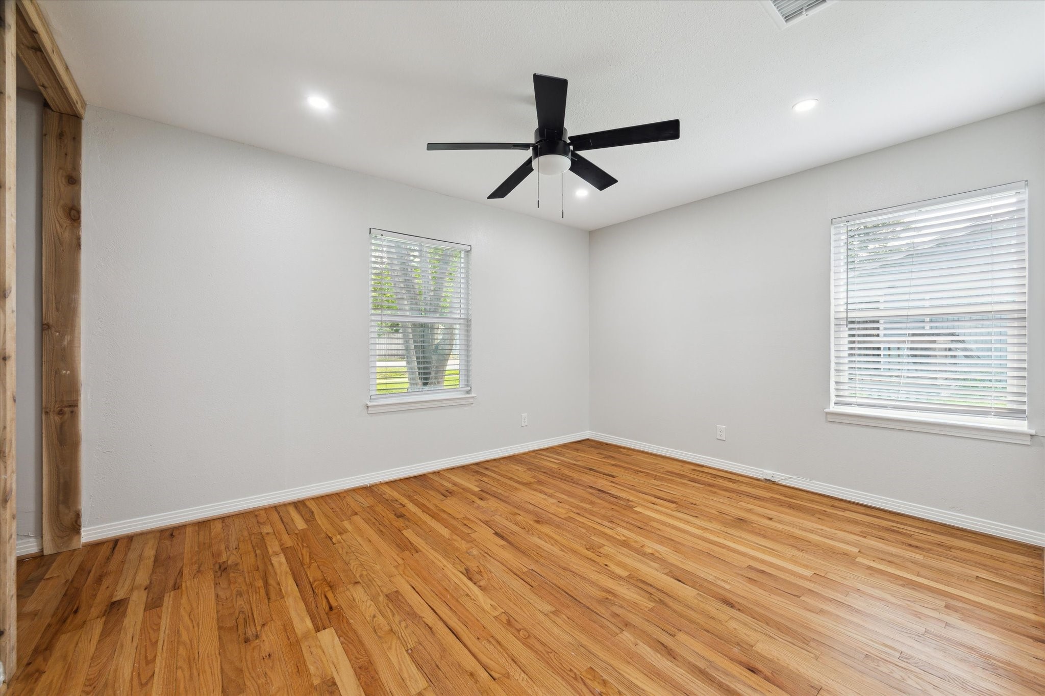 522 Barkley Street Houston, TX 77022 - Photo 10 of 18 This secondary bedroom on the front corner of the home benefits from a lot of natural light. Hardwood floors and a newly installed closet space make this room stand out.