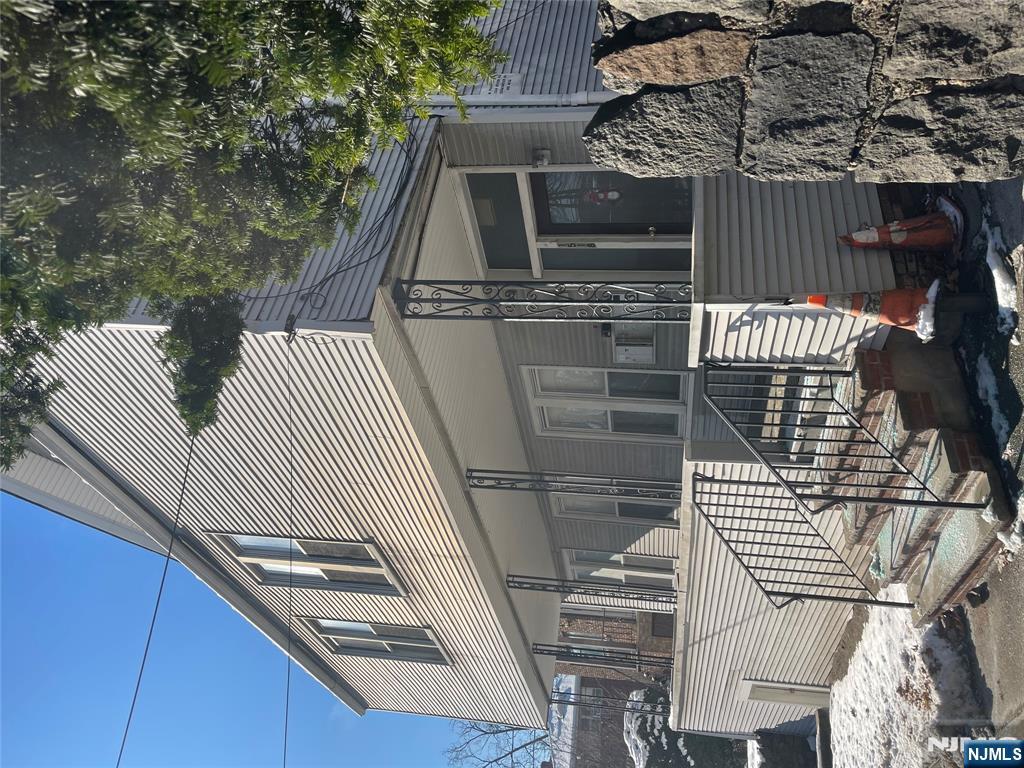 1518 River Road, Unit 3 Edgewater, NJ 07020 - Photo 1 of 19 a view of a house with a large windows