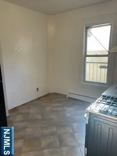 a view of a room that has a window in it