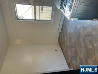 1518 River Road, Unit 3 Edgewater, NJ 07020 - Photo 12 of 19 a view of a room that has a window in it