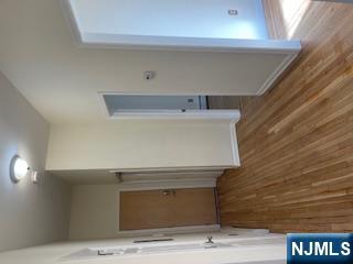1518 River Road, Unit 3 Edgewater, NJ 07020 - Photo 5 of 19 a view of a room with wooden floor