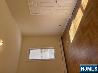 1518 River Road, Unit 3 Edgewater, NJ 07020 - Photo 8 of 19 an empty room with window