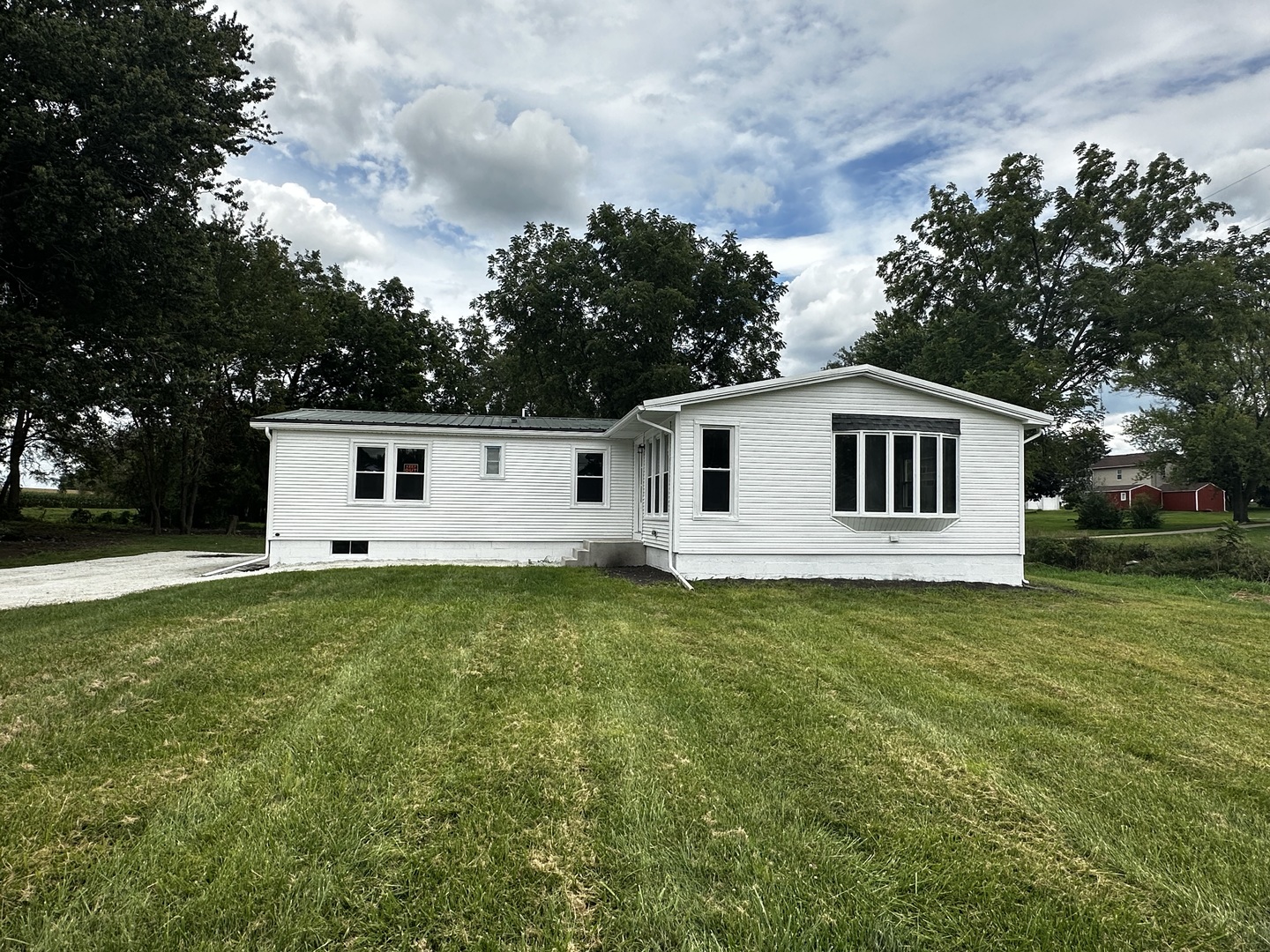 a house view with a garden space