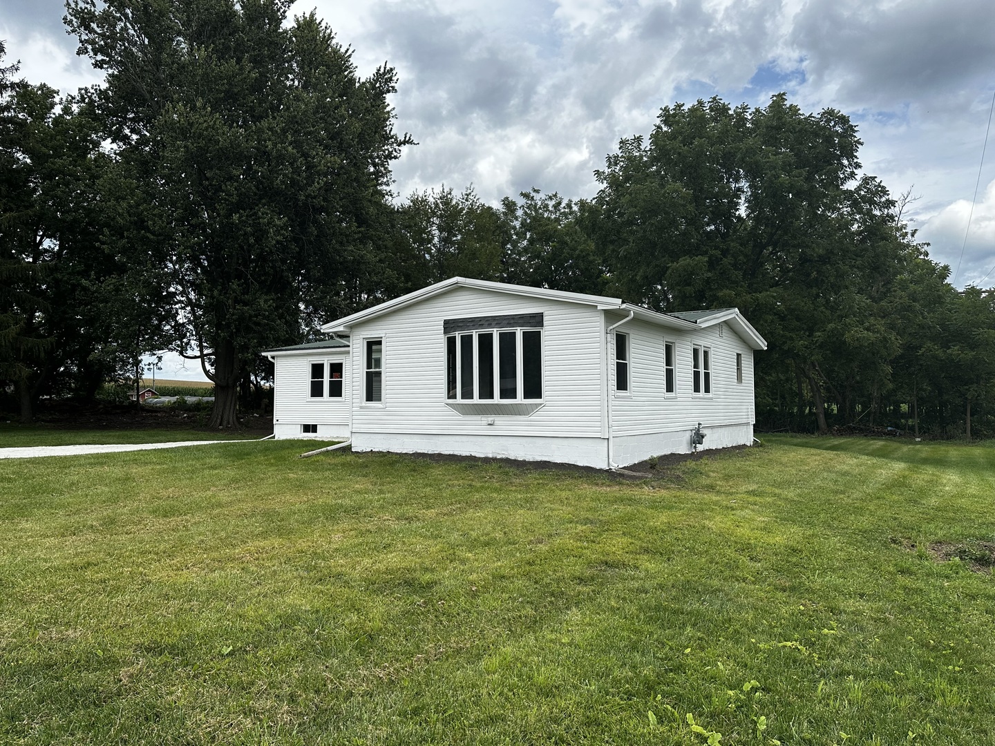 764 Brooklyn Road West Brooklyn, IL 61378 - Photo 2 of 33 a view of a house with a yard