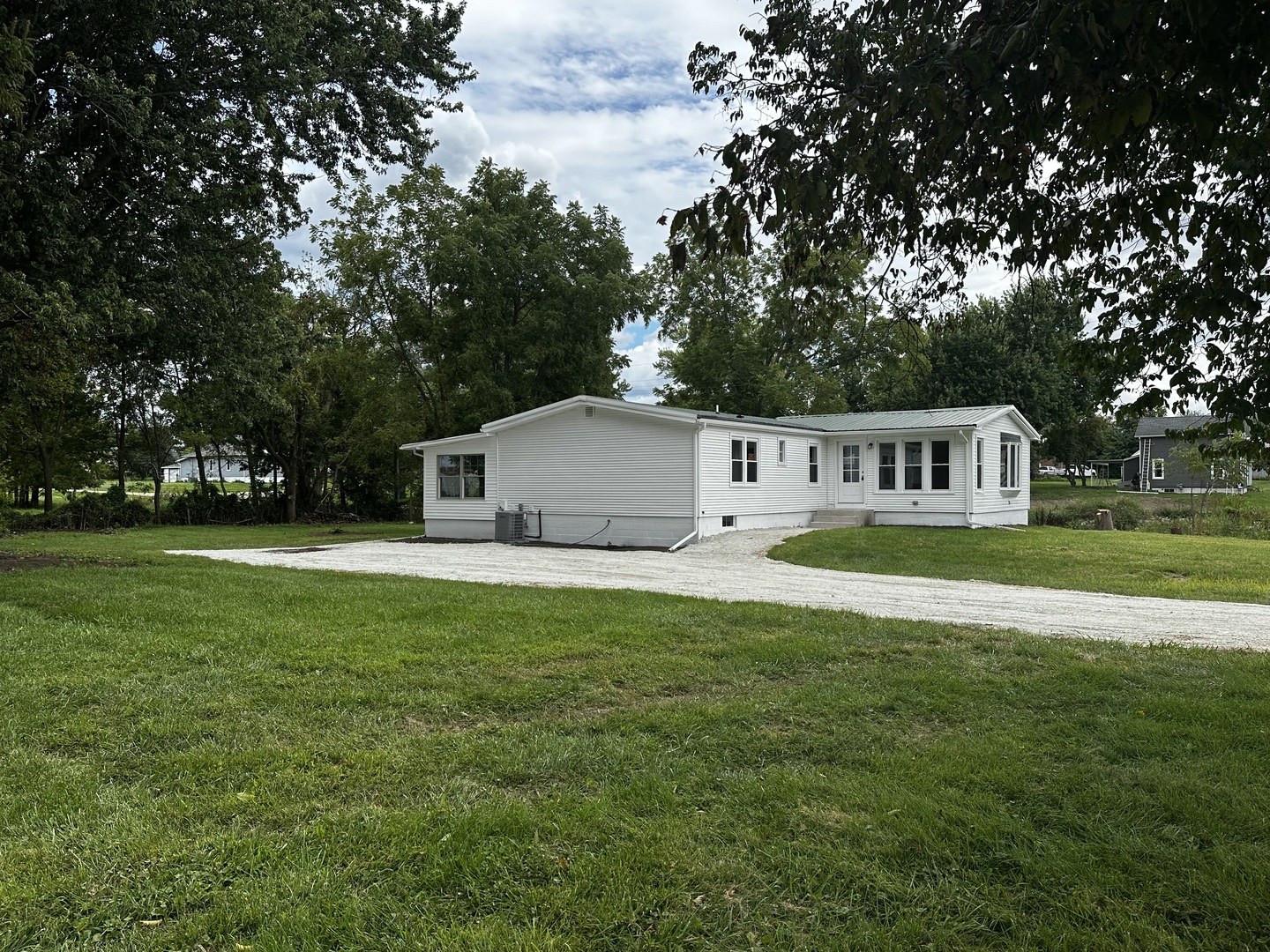 764 Brooklyn Road West Brooklyn, IL 61378 - Photo 3 of 33 a house view with a outdoor space