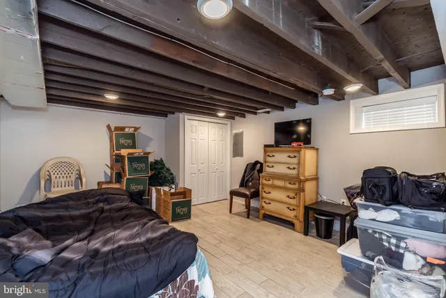 a bathroom with a shower a toilet and a sink