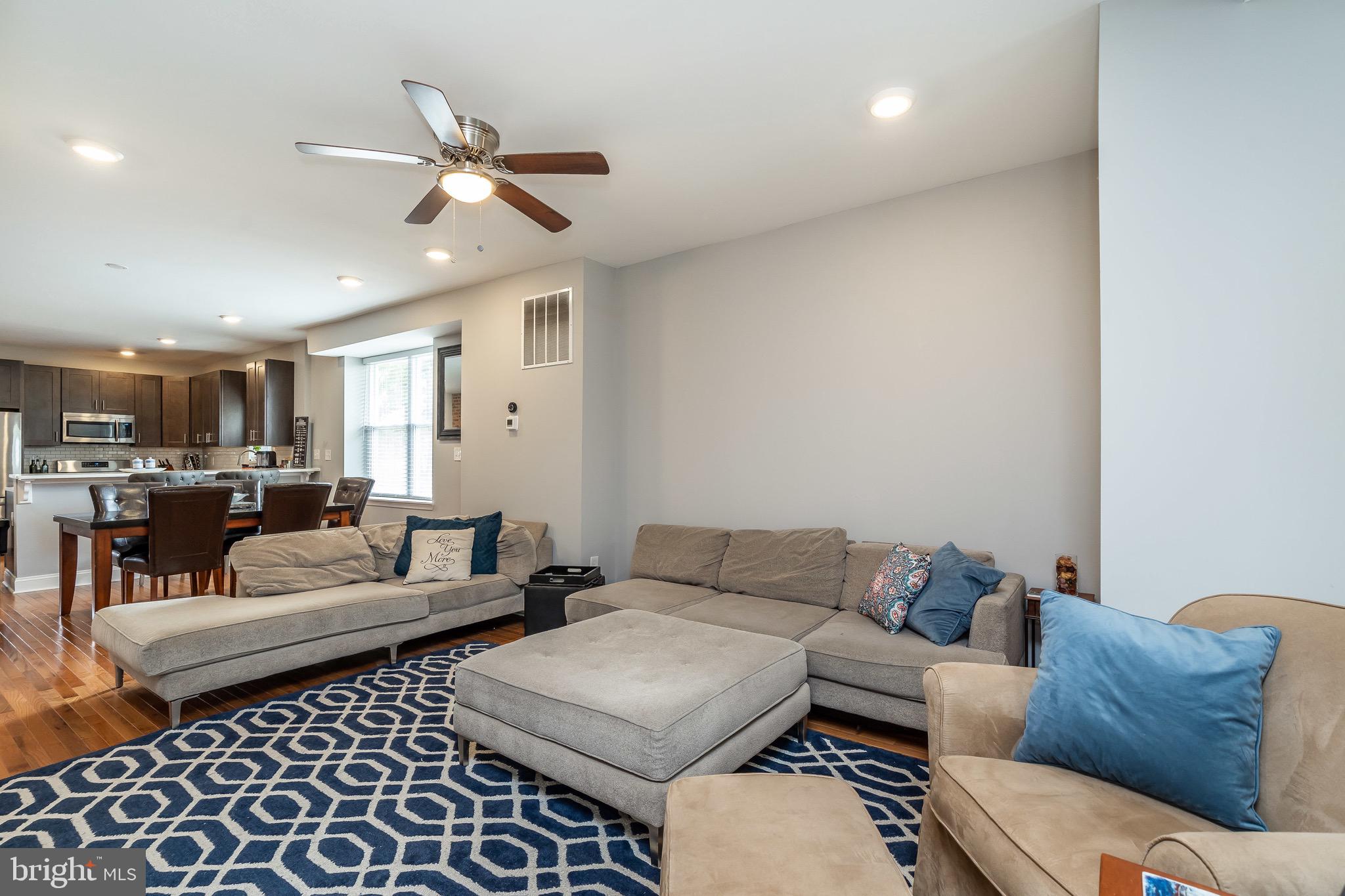 365 Bonsal Street Baltimore, MD 21224 - Photo 36 of 36 a living room with furniture and a rug