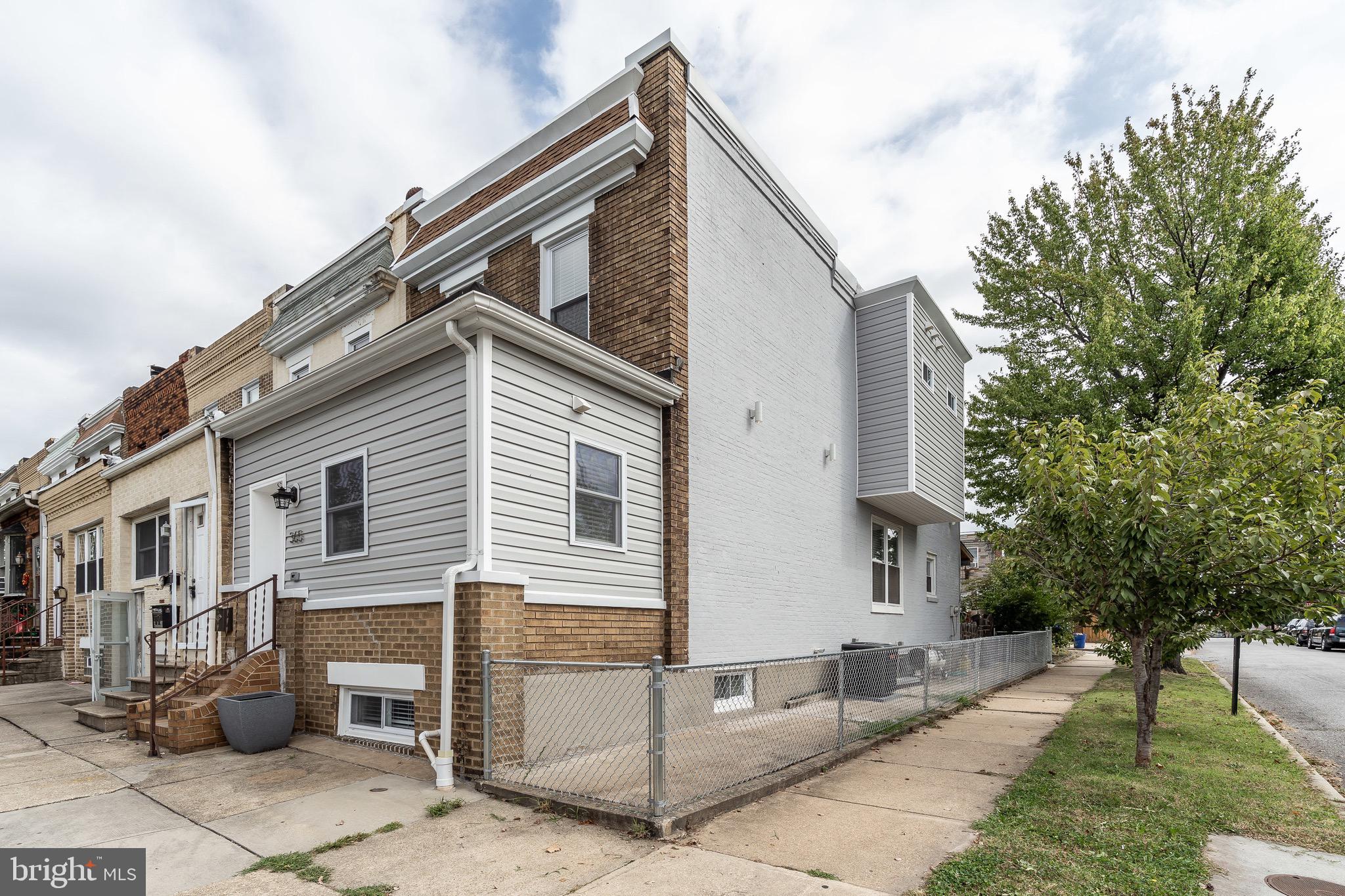 365 Bonsal Street Baltimore, MD 21224 - Photo 34 of 36 a view of a house with a yard