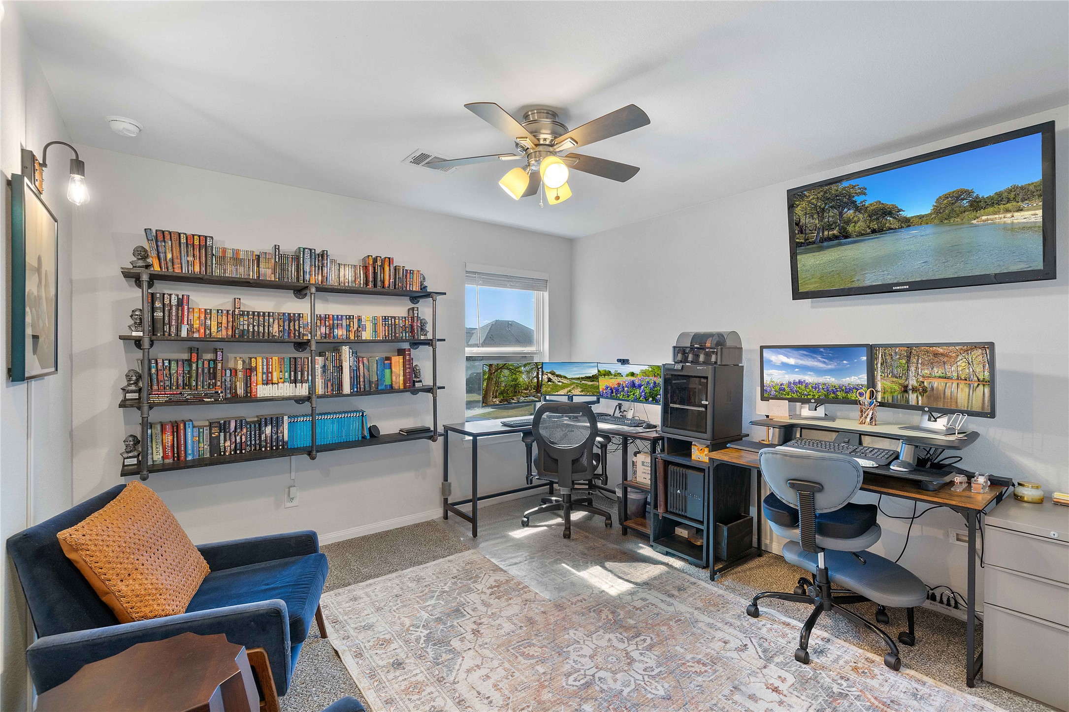 18623 Jerrara Stream Lane Katy, TX 77449 - Photo 17 of 46 The second guest bedroom has lots of room to be made into the home owner's choice. Currently used as an office, this space has industrial shelving for displays and lots of added lighting to personalize the space.