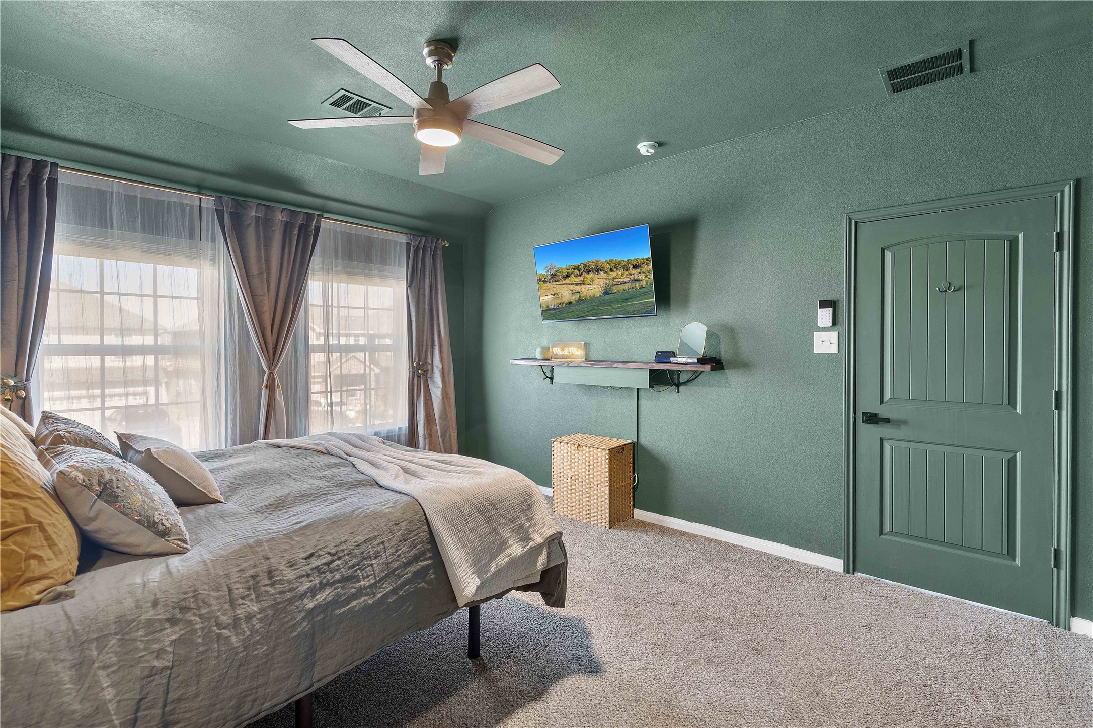 18623 Jerrara Stream Lane Katy, TX 77449 - Photo 20 of 46 Seamlessly transition into this home that includes a mantle for TV chord storage and extra display room. The custom headboard is excluded in the sale.