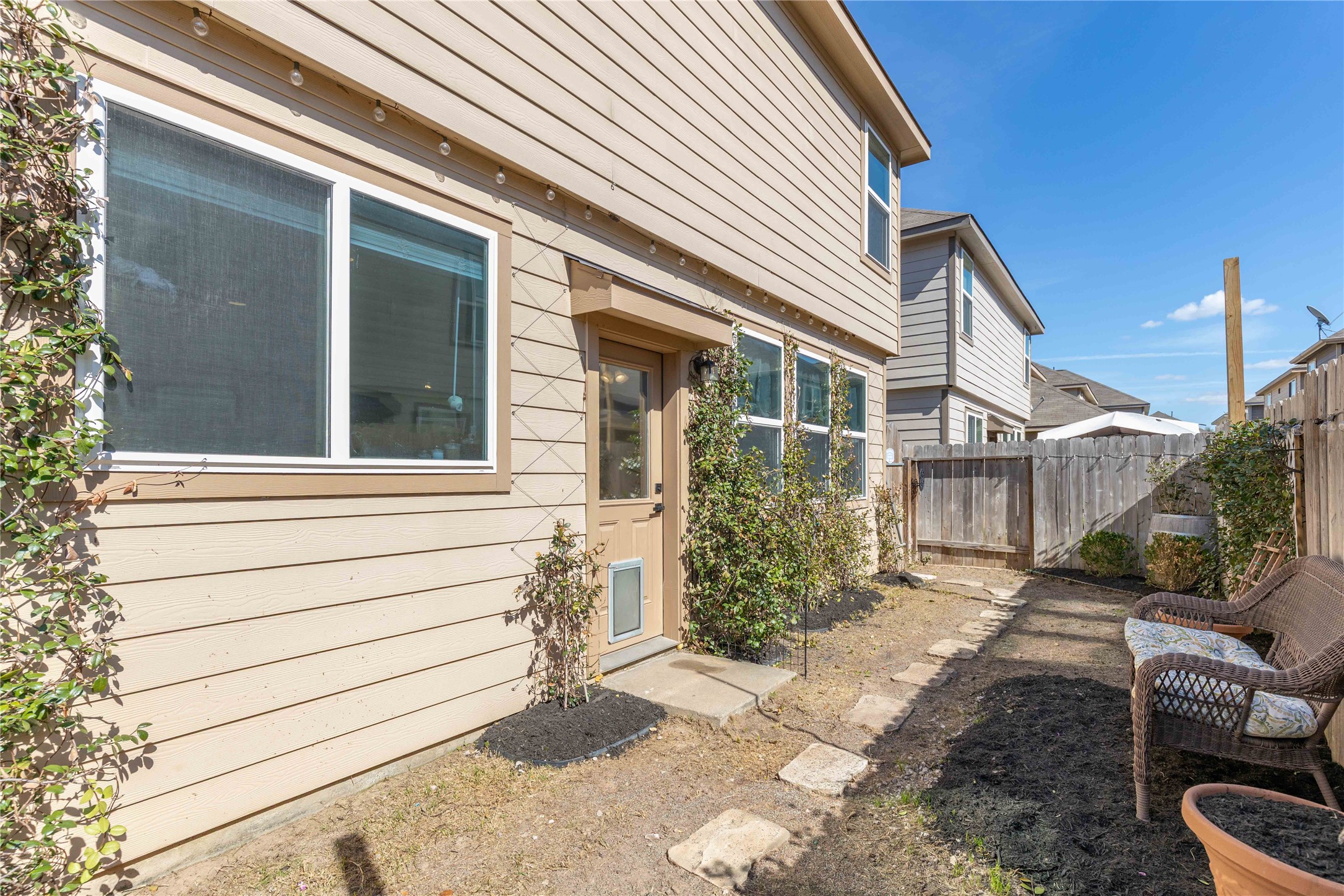 18623 Jerrara Stream Lane Katy, TX 77449 - Photo 32 of 46 Have your dogs let themselves out right off of the kitchen into their private backyard. Ground has been seeded and recently landscaped - ready for move-in.