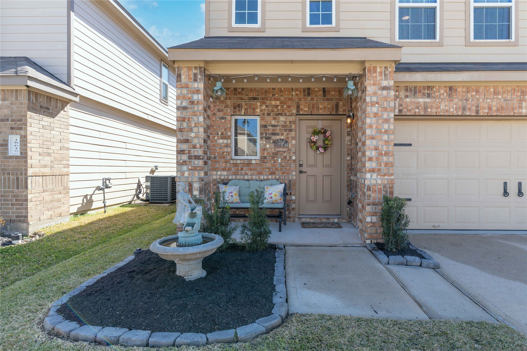 18623 Jerrara Stream Lane Katy, TX 77449 - Photo 42 of 46 Can you say curb appeal? The home was recently landscaped and is ready for spring florals to thrive in the front flower beds. You've got room on the porch for a bench as well. Fountain does not remain with the home.