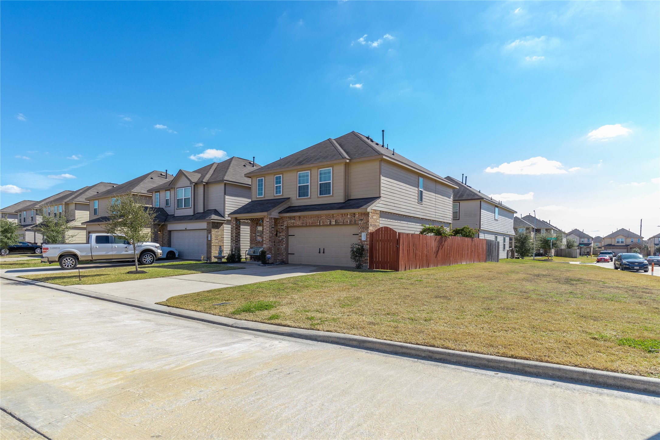 18623 Jerrara Stream Lane Katy, TX 77449 - Photo 45 of 46 A beautiful home in an ultra-convenient location for those working inside the Houston loop. Although the property line follows the extended fence on the right side of the home, the grass area next to it is perfect for an outside party or Christmas decorations!