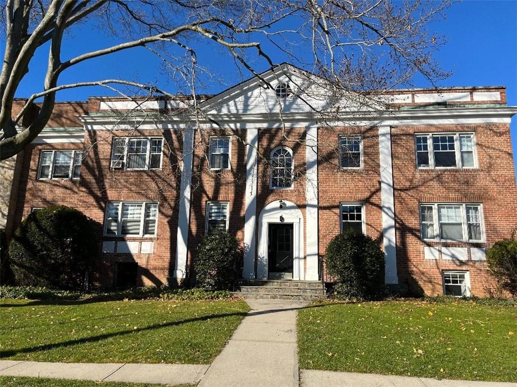 5 Laurel Street, Unit D3 Rye, NY 10580 - Photo 1 of 1 front view of a house with a yard
