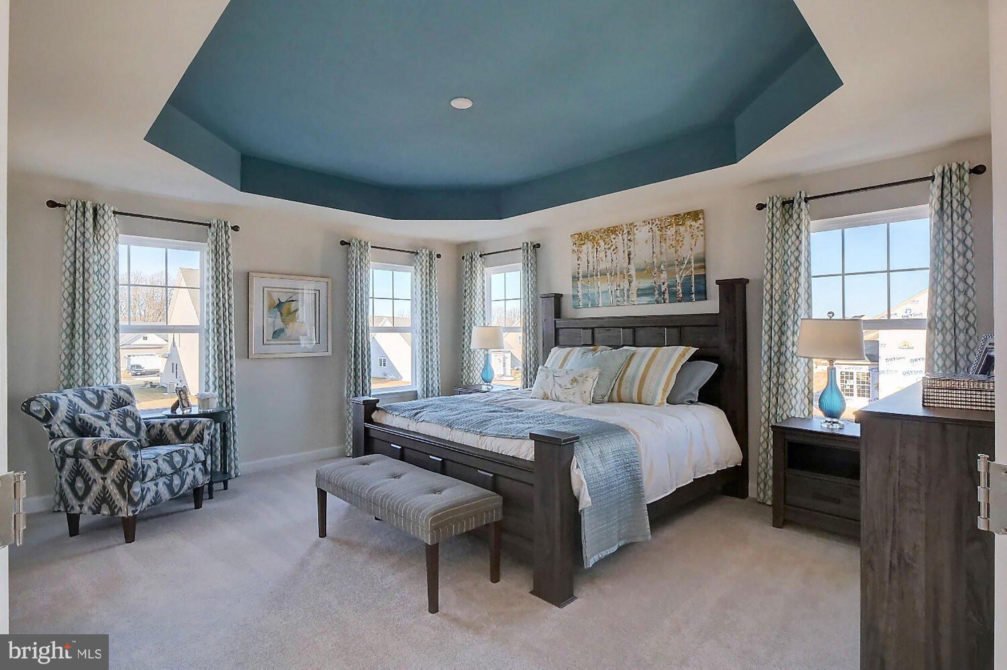 1546 Shipsview Road Annapolis, MD 21409 - Photo 11 of 13 a bedroom with a bed and furniture