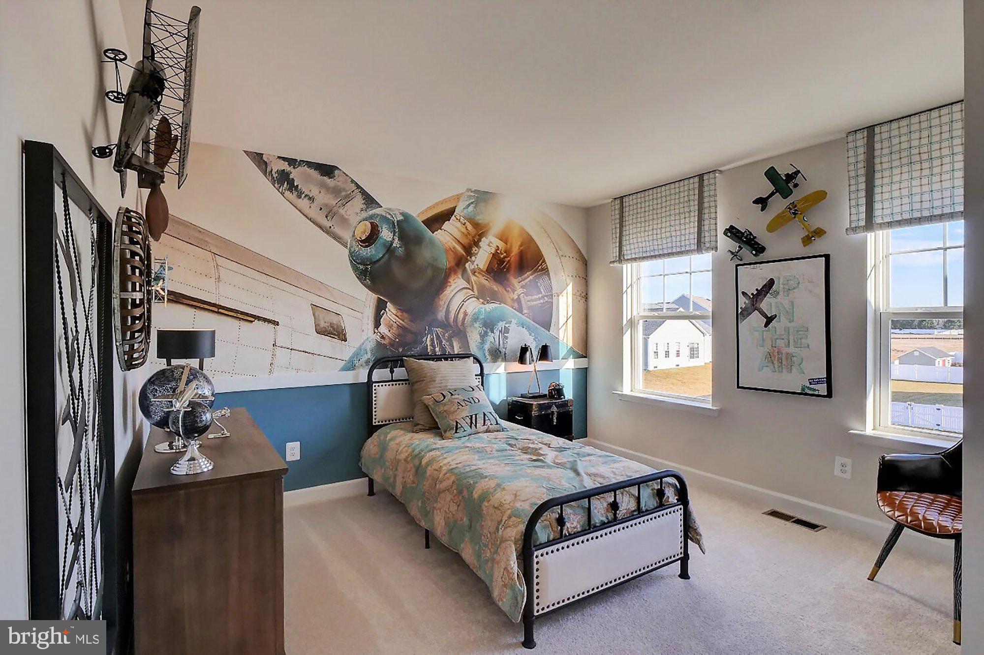 1546 Shipsview Road Annapolis, MD 21409 - Photo 12 of 13 a bedroom with a bed and a window