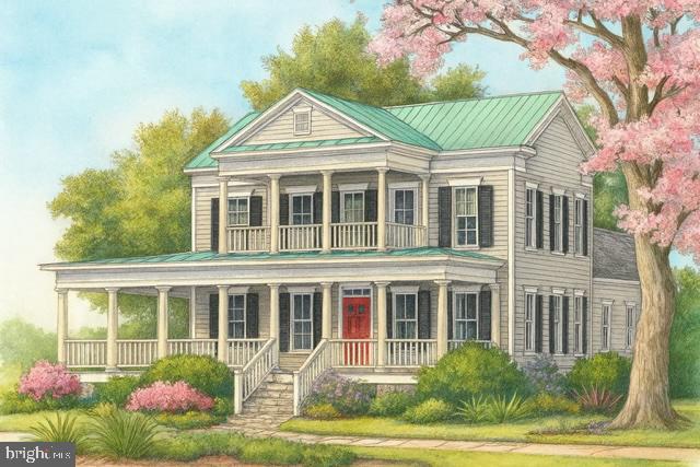 1546 Shipsview Road Annapolis, MD 21409 - Photo 2 of 13 a front view of a house with a yard and potted plants