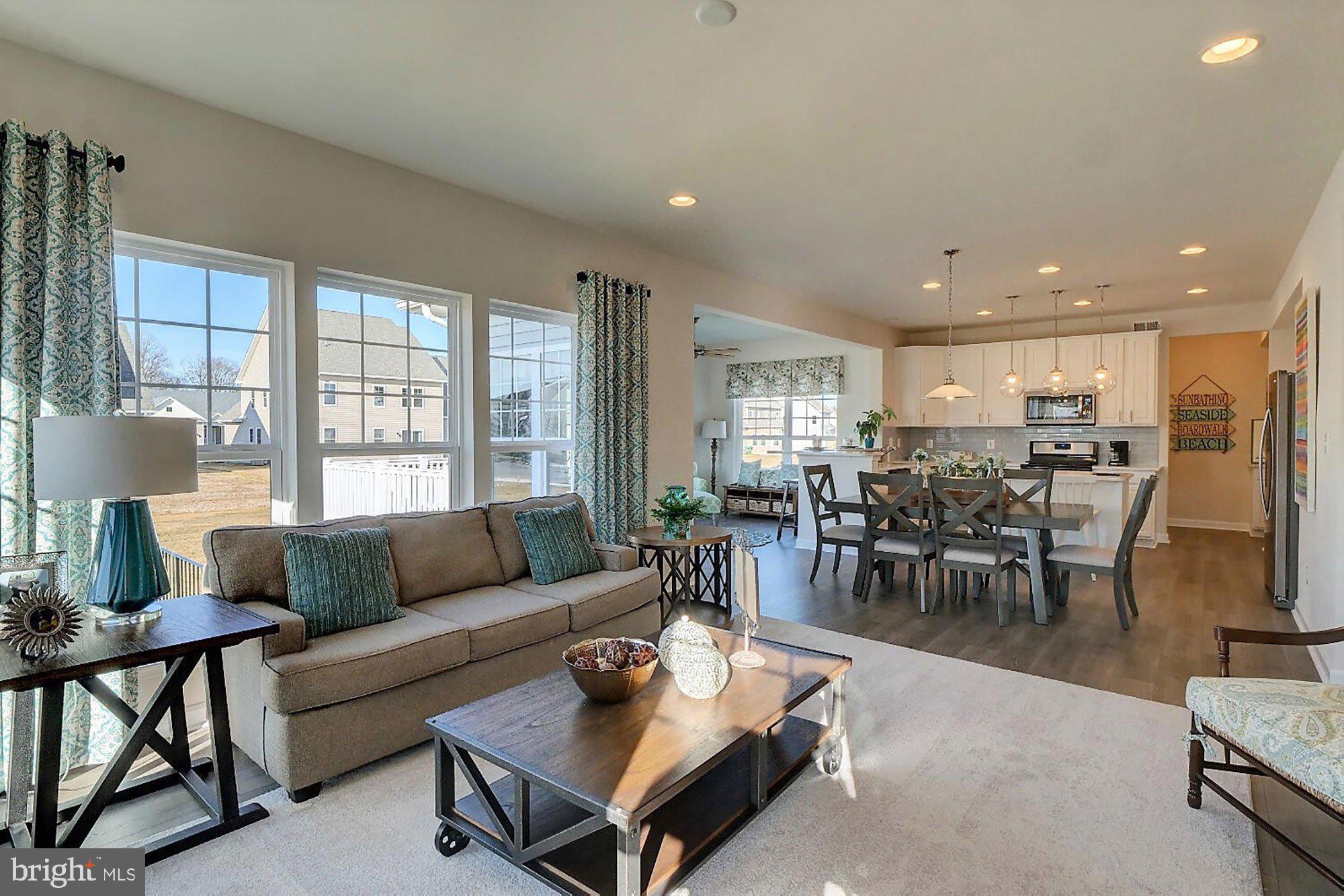 1546 Shipsview Road Annapolis, MD 21409 - Photo 4 of 13 a living room with furniture and a large window
