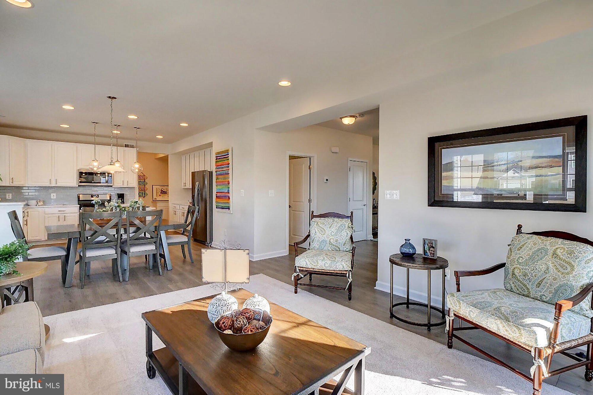 1546 Shipsview Road Annapolis, MD 21409 - Photo 5 of 13 a living room with furniture and a flat screen tv