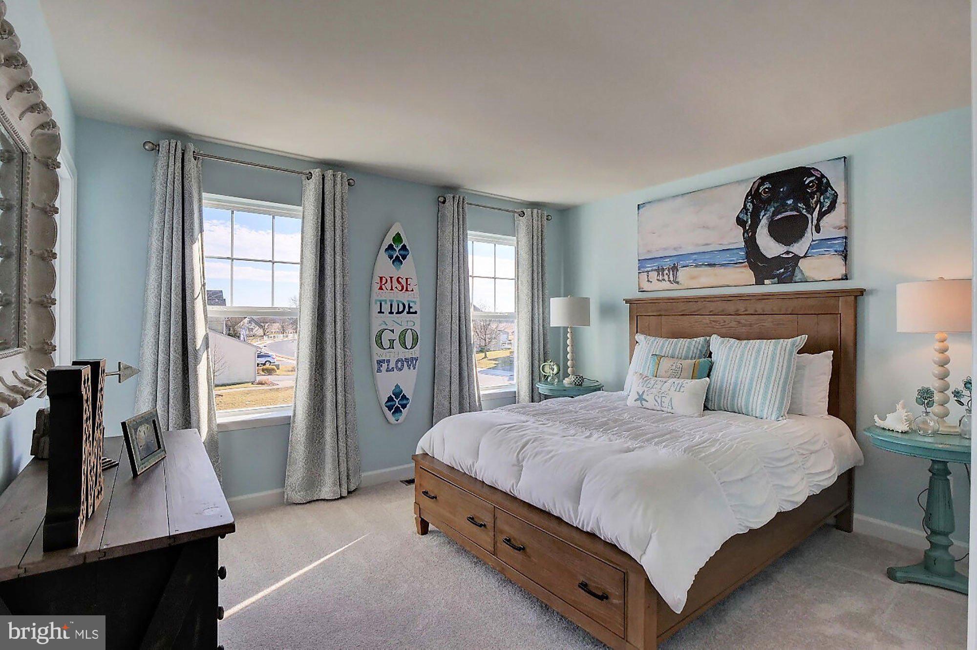 1546 Shipsview Road Annapolis, MD 21409 - Photo 10 of 13 a bedroom with a bed and a desk