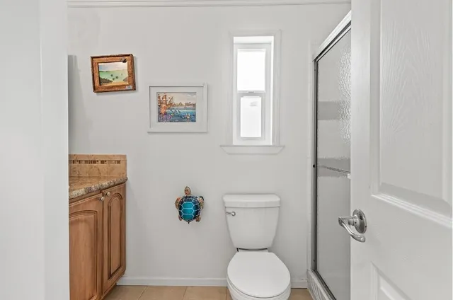 a view of a balcony with wooden floor