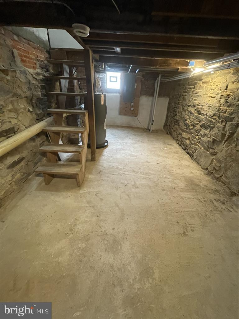 1509 Lemmon Street Baltimore, MD 21223 - Photo 13 of 14 a view of an empty room with stairs