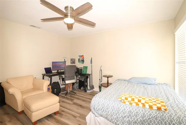 a bed room with a bed and a couch