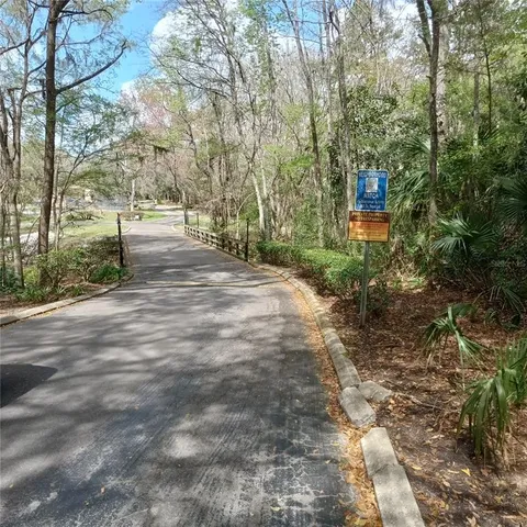 a view of a backyard of the house
