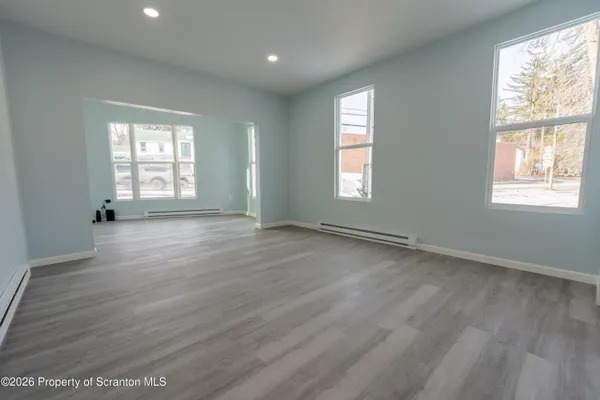 an empty room with windows