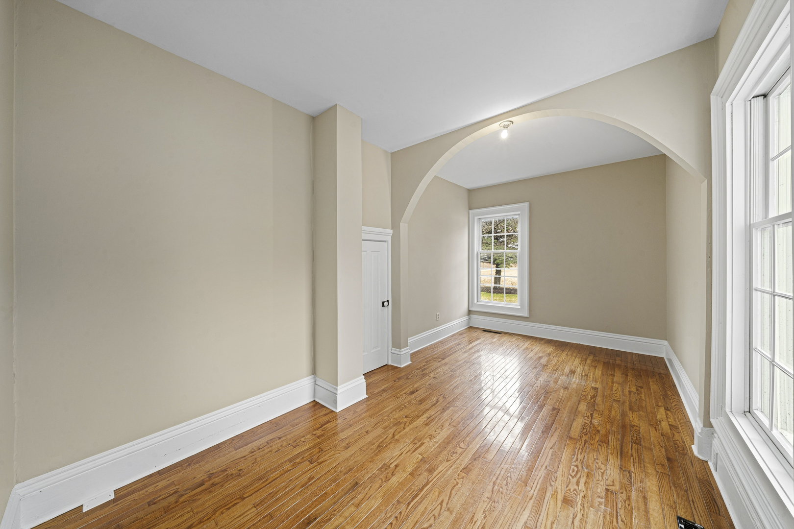 16645 Lasher Road Hinckley, IL 60520 - Photo 18 of 80 an empty room with wooden floor and windows