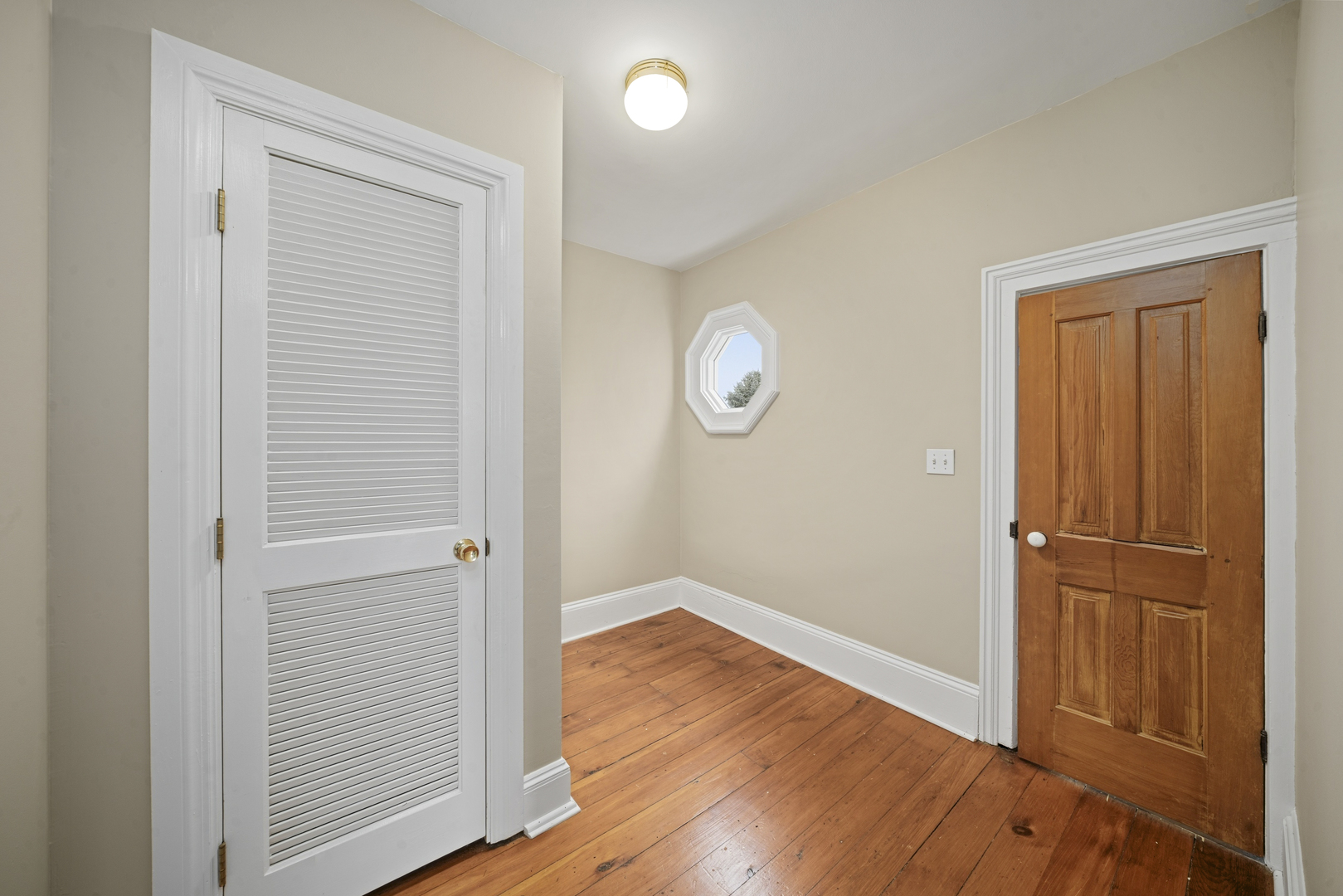 16645 Lasher Road Hinckley, IL 60520 - Photo 32 of 80 an empty room with wooden floor and closet