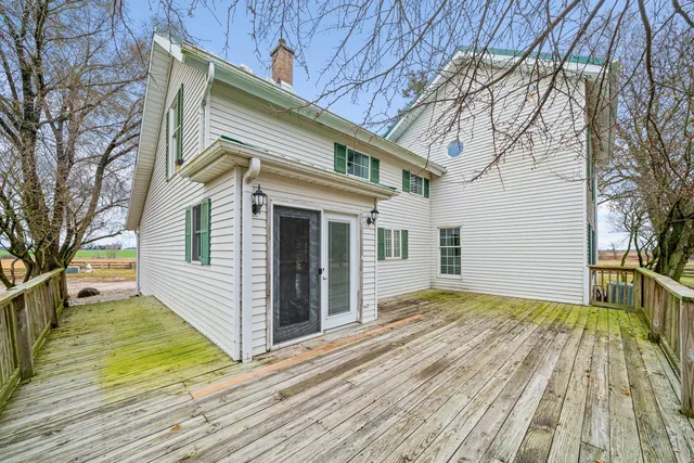 a view of a large building with a swimming pool