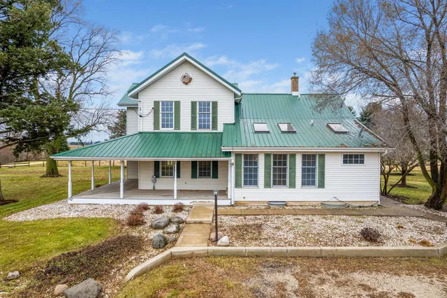 a front view of house with outdoor space