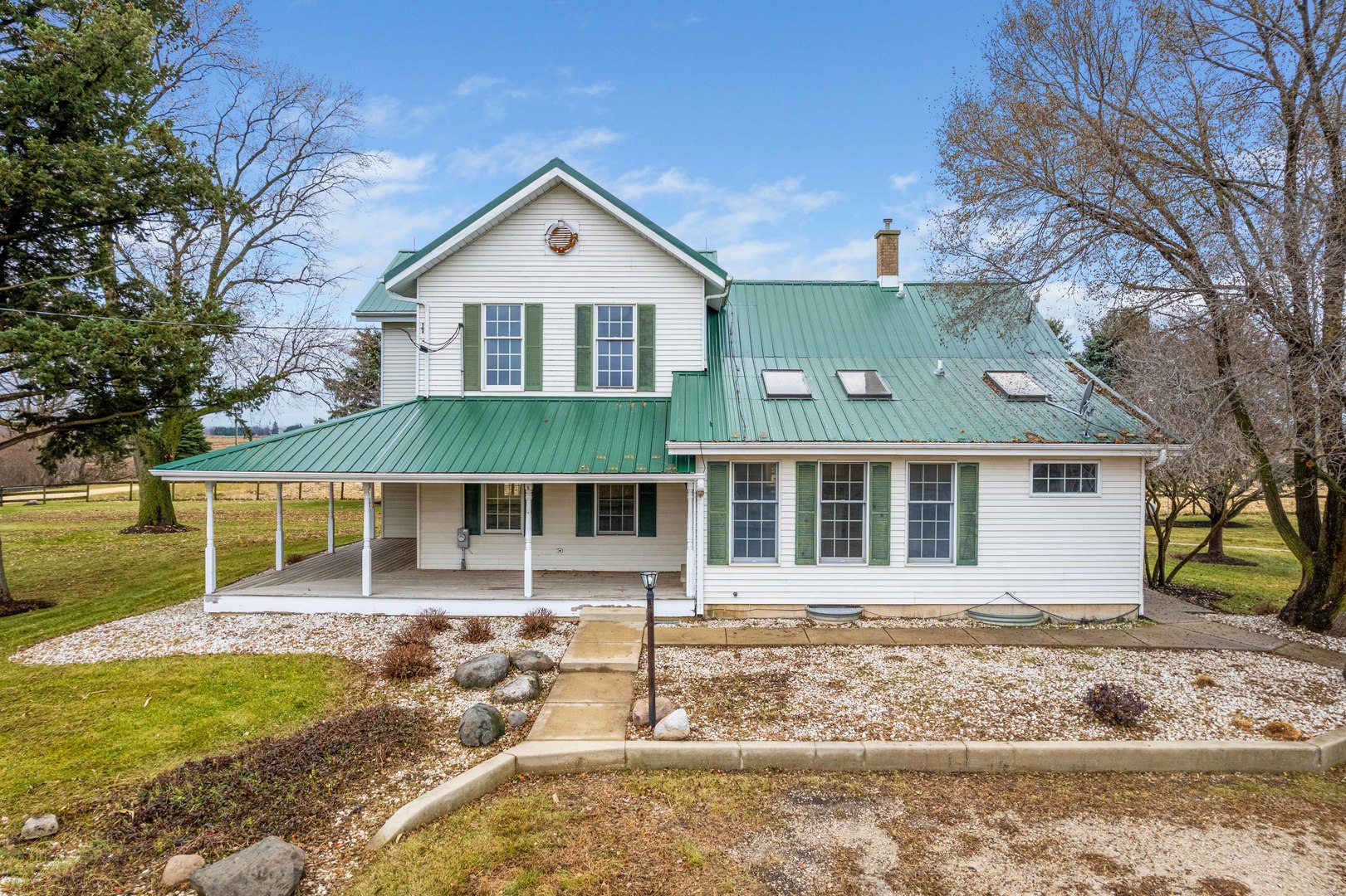 16645 Lasher Road Hinckley, IL 60520 - Photo 41 of 80 a front view of a house with garden